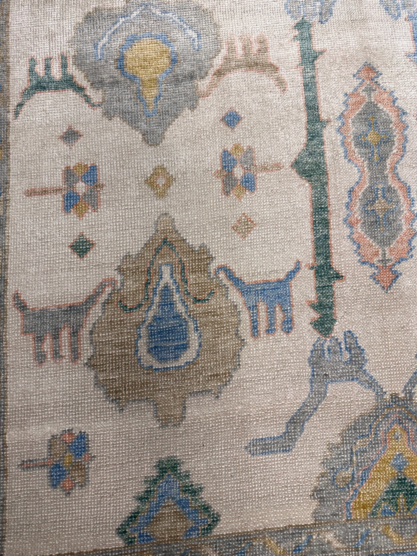 Handwoven Wool Anatolian Uşak Rug with Animal Figures