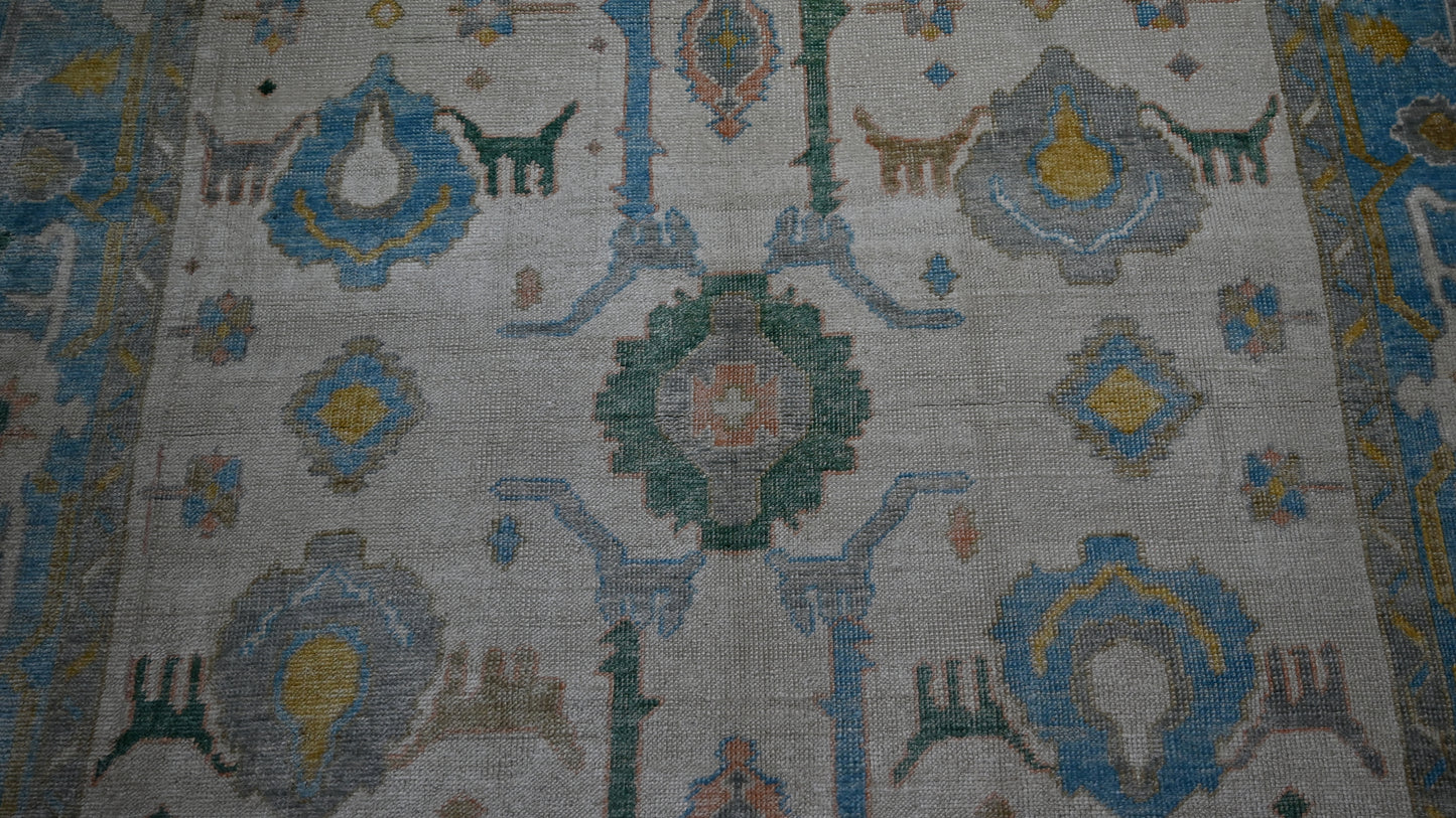 Handwoven Wool Anatolian Uşak Rug with Animal Figures